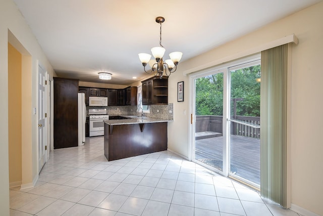 339 Windsor Dr, Bartlett, IL 60103 - kitchen featuring white appliances, open shelves, a peninsula, dark brown cabinets, and a chandelier