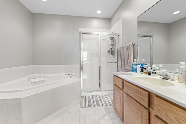 18211 Eagle Dr, Tinley Park, IL 60477 - bathroom with vanity, a bath, a stall shower, recessed lighting, and tile patterned flooring