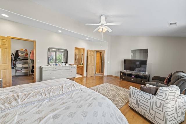 18211 Eagle Dr, Tinley Park, IL 60477 - bedroom featuring a spacious closet, recessed lighting, light wood-type flooring, a closet, and a ceiling fan