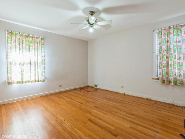5547 N California Ave, Chicago, IL 60625 - unfurnished room featuring light wood-style flooring and ceiling fan