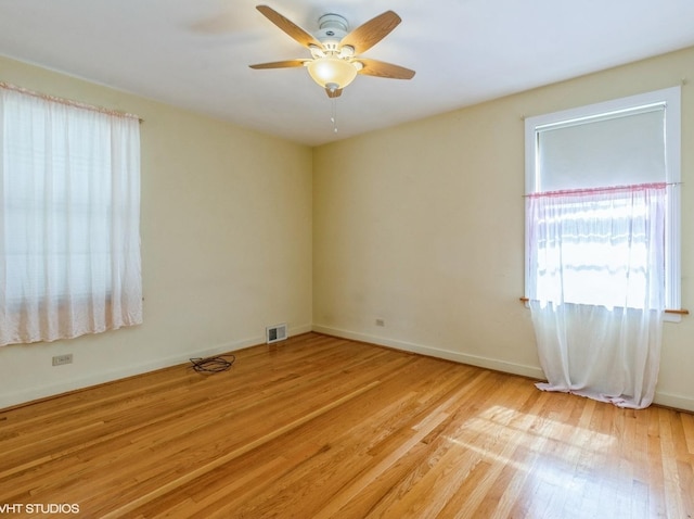 5547 N California Ave, Chicago, IL 60625 - empty room featuring wood finished floors and a ceiling fan
