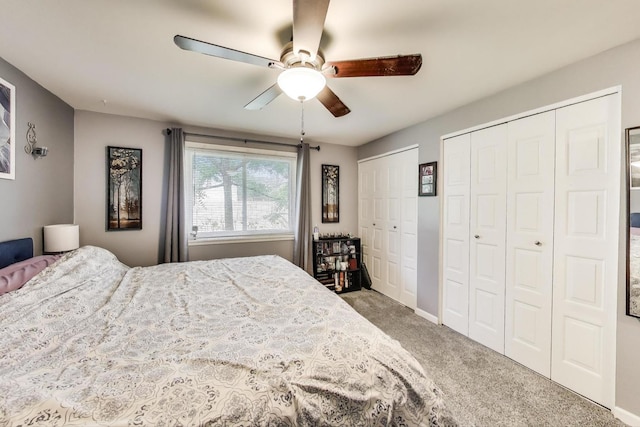 1042 Quanset Ct, Schaumburg, IL 60194 - carpeted bedroom featuring two closets and ceiling fan