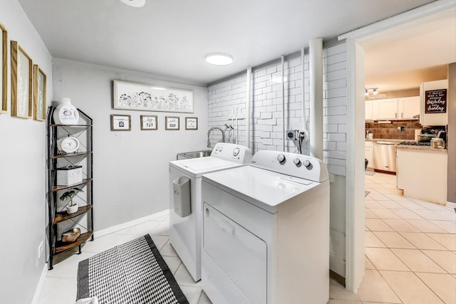 1042 Quanset Ct, Schaumburg, IL 60194 - washroom with washer and clothes dryer and light tile patterned flooring