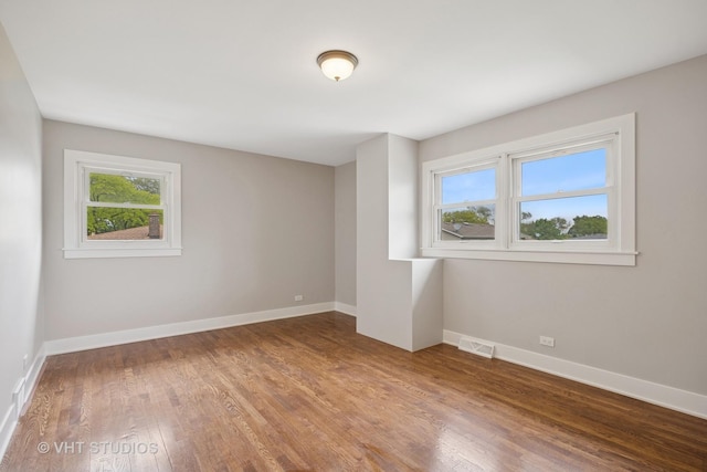 715 N Lawler Ave, Addison, IL 60101 - unfurnished room featuring wood finished floors