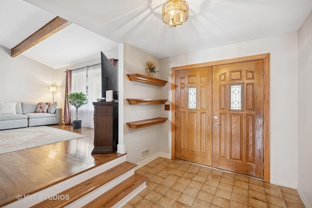 715 N Lawler Ave, Addison, IL 60101 - foyer featuring baseboards