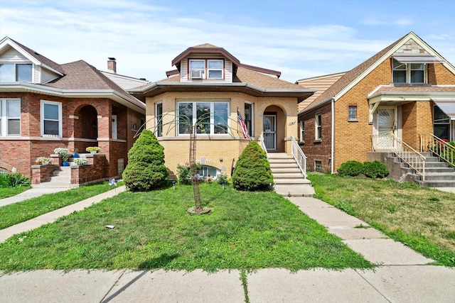 11030 S Ave L, Chicago, IL 60617 - view of front of property featuring a front lawn and brick siding