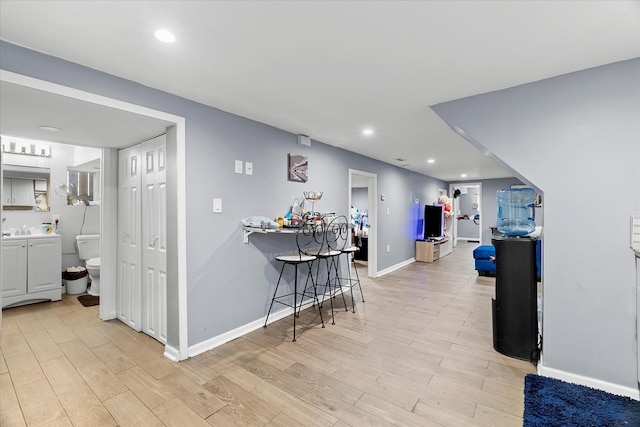 11030 S Ave L, Chicago, IL 60617 - kitchen featuring light wood-style floors and recessed lighting