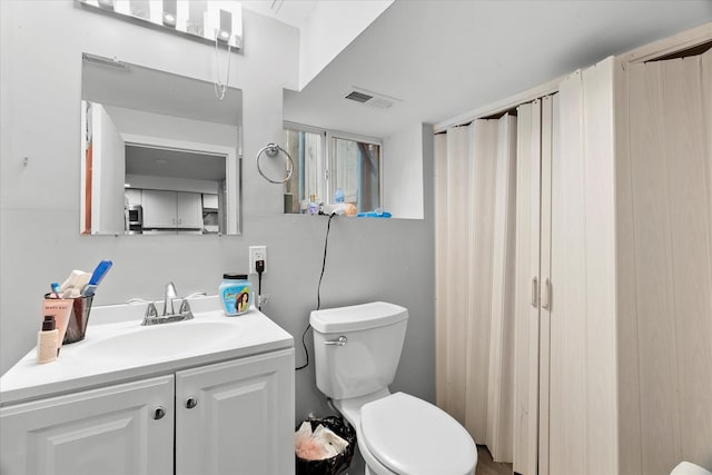 11030 S Ave L, Chicago, IL 60617 - bathroom with toilet and vanity