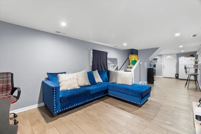 11030 S Ave L, Chicago, IL 60617 - living area featuring stairs, light wood-style floors, and recessed lighting