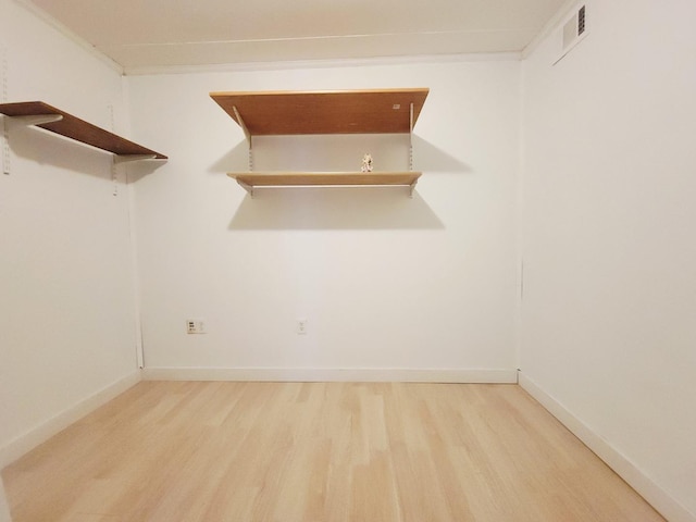 1357 Morgan St, Joliet, IL 60436 - spacious closet with light wood finished floors