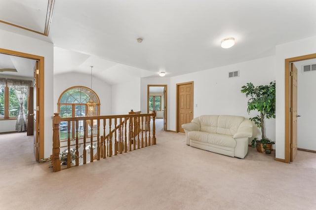 1007 Wildwood Ln, Mount Prospect, IL 60056 - living area with an upstairs landing, carpet flooring, and lofted ceiling