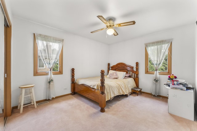 1007 Wildwood Ln, Mount Prospect, IL 60056 - bedroom with light colored carpet and a ceiling fan
