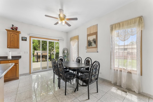 1007 Wildwood Ln, Mount Prospect, IL 60056 - dining space featuring a ceiling fan and baseboards