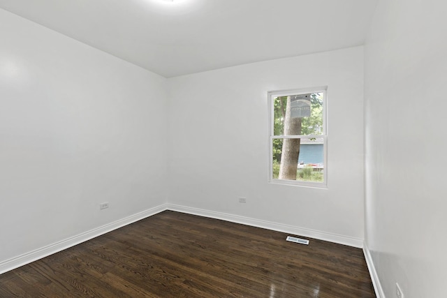1668 Buena Vista Ave, Chicago Heights, IL 60411 - spare room with dark wood-style flooring and baseboards