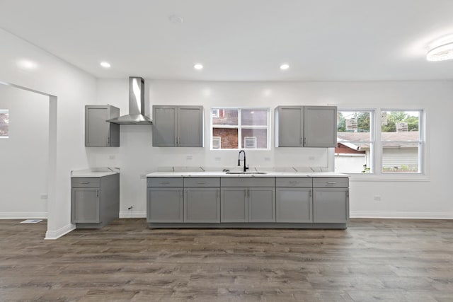 1668 Buena Vista Ave, Chicago Heights, IL 60411 - kitchen with wall chimney range hood, gray cabinetry, dark wood-style flooring, and recessed lighting