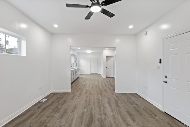 1668 Buena Vista Ave, Chicago Heights, IL 60411 - unfurnished living room featuring wood finished floors, ceiling fan, and recessed lighting