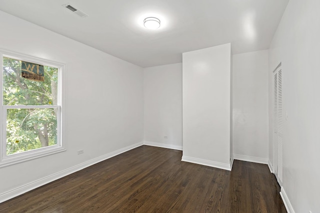1668 Buena Vista Ave, Chicago Heights, IL 60411 - spare room with dark wood-style floors and healthy amount of natural light
