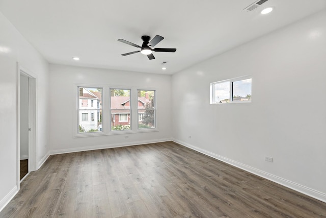 1668 Buena Vista Ave, Chicago Heights, IL 60411 - unfurnished room with healthy amount of natural light, dark wood-style flooring, recessed lighting, and ceiling fan
