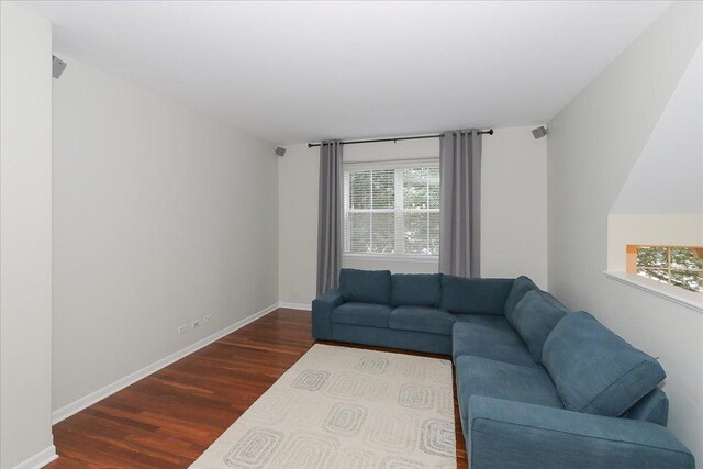1137 N Claremont Dr, Palatine, IL 60074 - living room with wood finished floors and baseboards