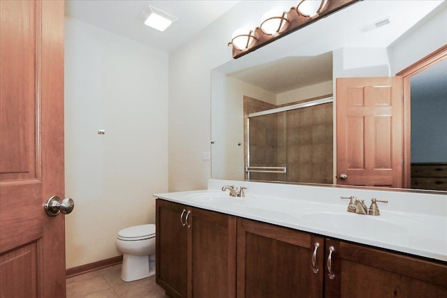 1137 N Claremont Dr, Palatine, IL 60074 - bathroom featuring double vanity, tiled shower, and tile patterned flooring