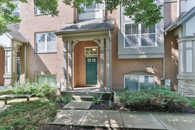 1137 N Claremont Dr, Palatine, IL 60074 - doorway to property with brick siding