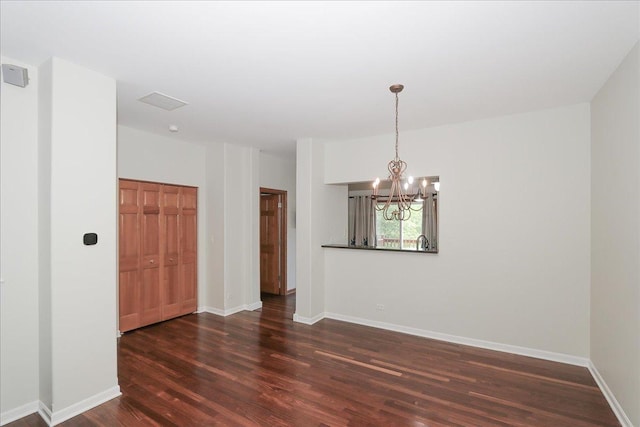 1137 N Claremont Dr, Palatine, IL 60074 - empty room featuring dark wood-style flooring and a chandelier