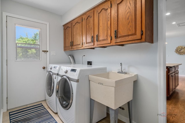 555 W Everett Rd, Lake Forest, IL 60045 - laundry room featuring cabinet space, independent washer and dryer, and recessed lighting