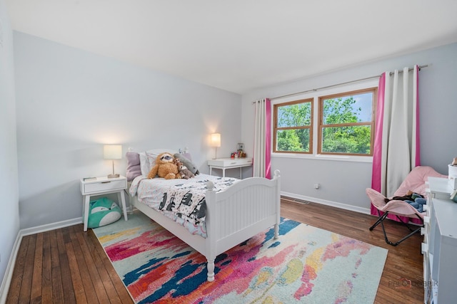 555 W Everett Rd, Lake Forest, IL 60045 - bedroom with baseboards and wood finished floors