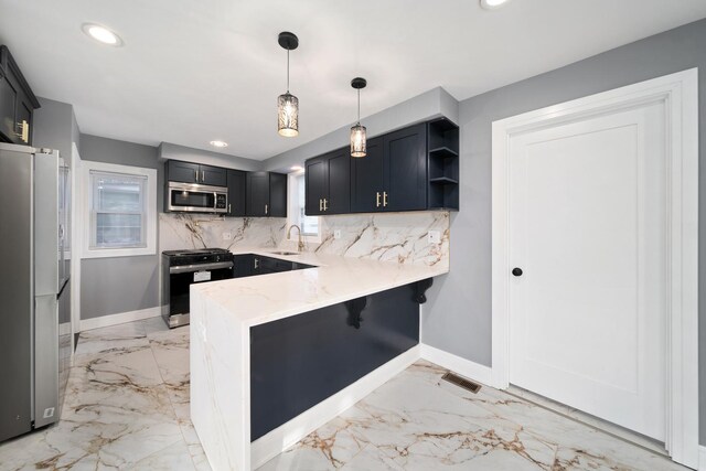 10806 S Vernon Ave, Chicago, IL 60628 - kitchen featuring appliances with stainless steel finishes, a peninsula, tasteful backsplash, light marble finish flooring, and recessed lighting