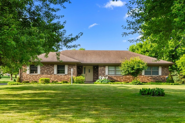 23201 Norma Ln, Harvard, IL 60033 - ranch-style home featuring a front yard and brick siding