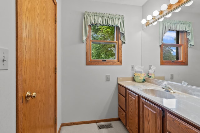 23201 Norma Ln, Harvard, IL 60033 - bathroom with vanity and baseboards
