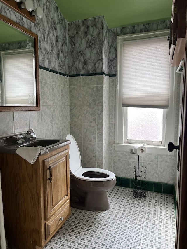 1451 N Latrobe Ave, Chicago, IL 60651 - half bath featuring tile walls and vanity