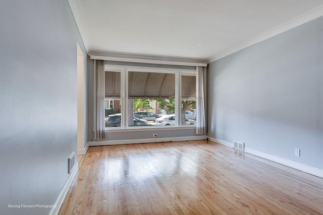 8822 S Paulina St, Chicago, IL 60620 - empty room with crown molding and wood finished floors