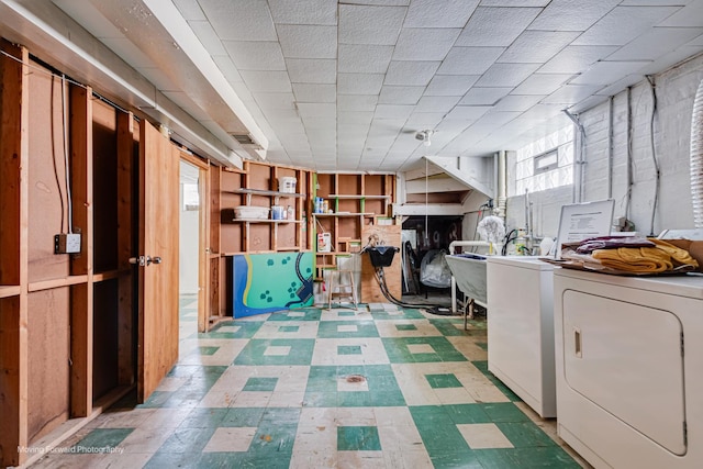 8822 S Paulina St, Chicago, IL 60620 - basement with washing machine and dryer and tile patterned floors