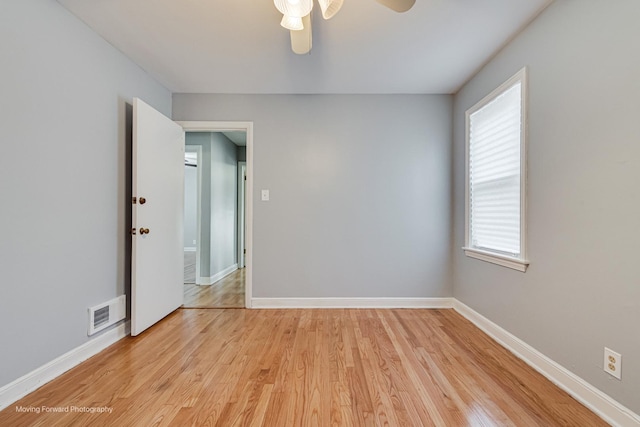 8822 S Paulina St, Chicago, IL 60620 - unfurnished room featuring ceiling fan and light wood-style flooring