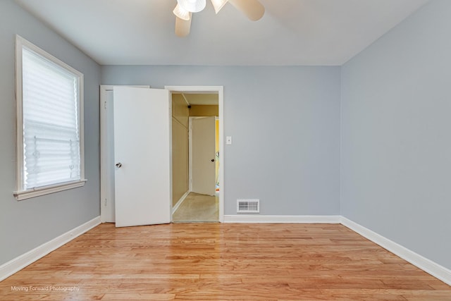 8822 S Paulina St, Chicago, IL 60620 - unfurnished bedroom with light wood finished floors and ceiling fan