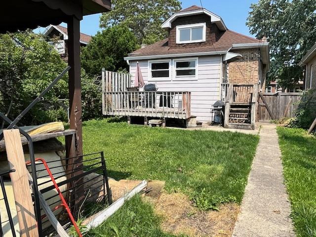 2722 Euclid Ave, Berwyn, IL 60402 - back of house with a wooden deck and a shingled roof