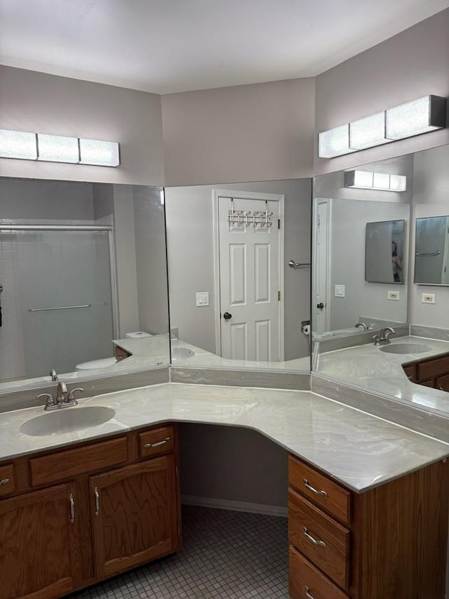 2404 Kenmore Ct, Schaumburg, IL 60193 - full bathroom with vanity, an enclosed shower, and tile patterned flooring