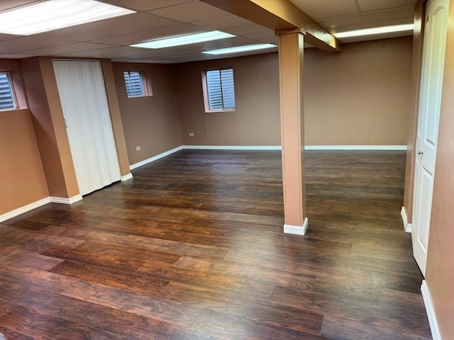 2404 Kenmore Ct, Schaumburg, IL 60193 - below grade area with baseboards and dark wood-style floors
