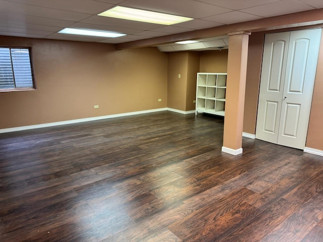 2404 Kenmore Ct, Schaumburg, IL 60193 - finished basement featuring dark wood-style floors and a paneled ceiling