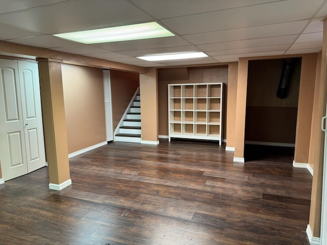 2404 Kenmore Ct, Schaumburg, IL 60193 - finished below grade area with stairs, wood finished floors, and a paneled ceiling