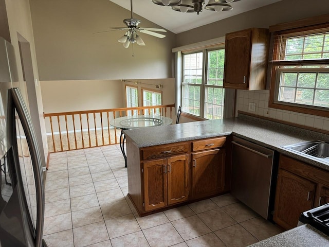 2404 Kenmore Ct, Schaumburg, IL 60193 - kitchen featuring dishwasher, lofted ceiling, a peninsula, freestanding refrigerator, and a ceiling fan