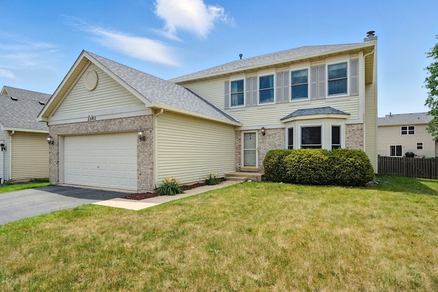 2942 Heather Ln, Montgomery, IL 60538 - view of front of property featuring brick siding, driveway, a garage, and a chimney