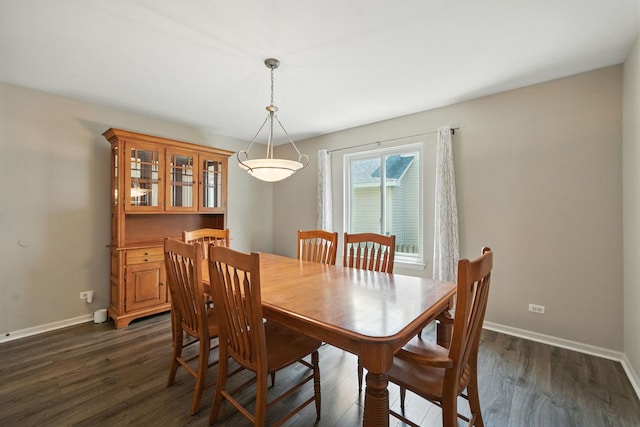 2942 Heather Ln, Montgomery, IL 60538 - dining room featuring dark wood-style flooring and baseboards