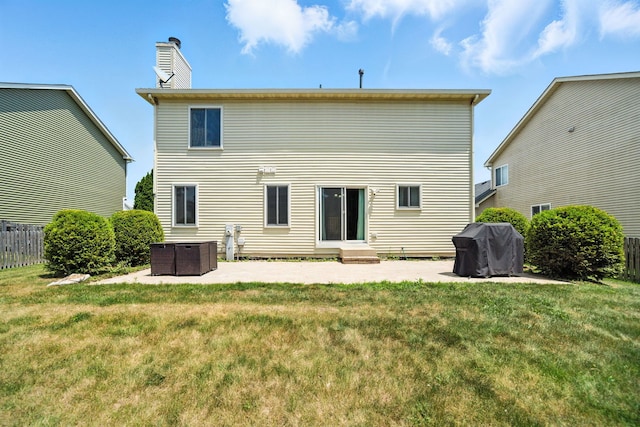 2942 Heather Ln, Montgomery, IL 60538 - rear view of property with a chimney, entry steps, a hot tub, and a patio area