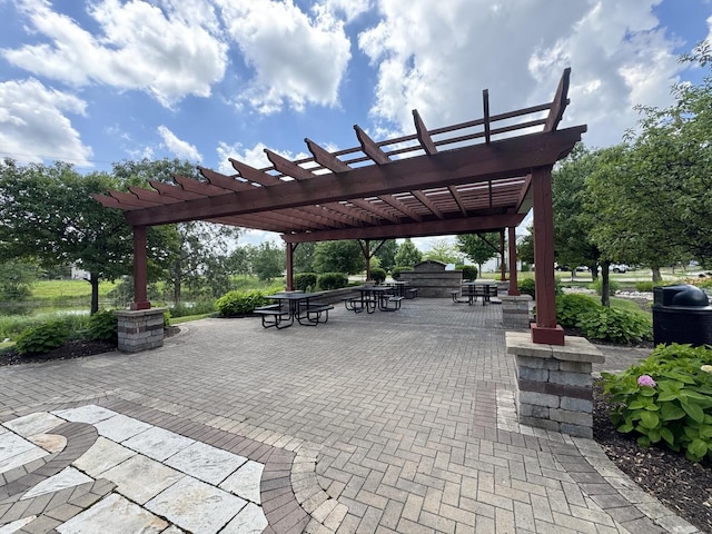 2942 Heather Ln, Montgomery, IL 60538 - view of community with a patio area and a pergola
