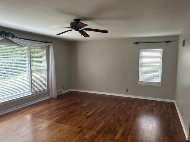 219 Spring Ave, Naperville, IL 60540 - unfurnished room with plenty of natural light, dark wood-style flooring, and ceiling fan