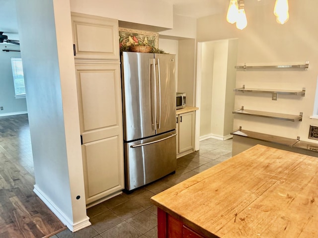 219 Spring Ave, Naperville, IL 60540 - kitchen with appliances with stainless steel finishes, dark tile patterned floors, a ceiling fan, and open shelves