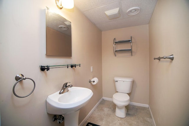 443 W Water St, Kankakee, IL 60901 - half bathroom featuring toilet and tile patterned flooring