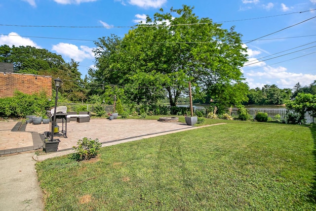 443 W Water St, Kankakee, IL 60901 - fenced backyard with a patio area and a water view